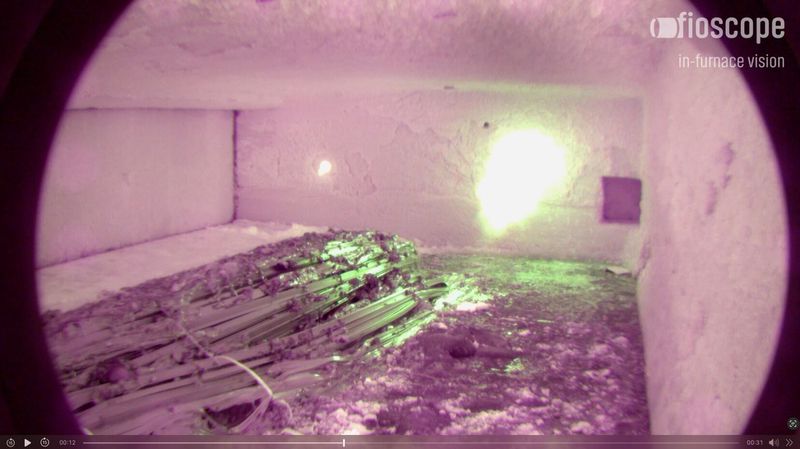 Scrap melting in a reverberatory furnace